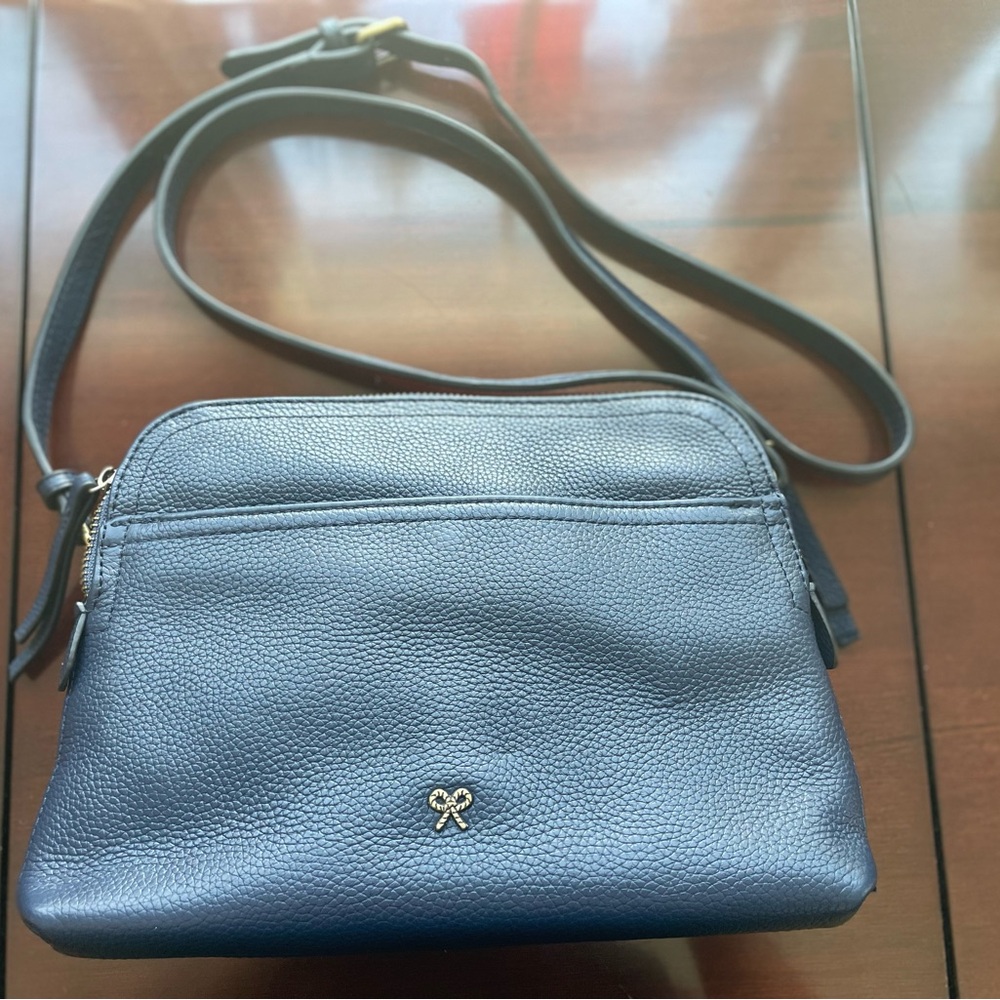 Women's Navy Pebbled Leather Crossbody with Gold Bow Accent